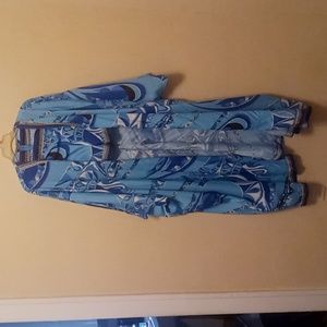 A beautiful pair of Maltese colored shorts with a flowing coat jacket to match